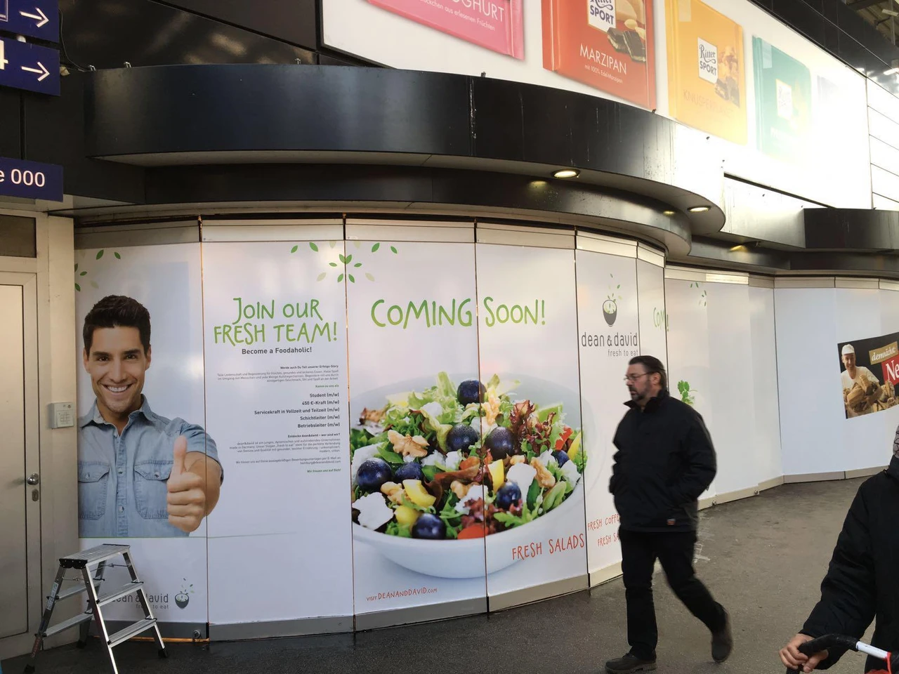 Dean & David Shopping-Center Bauzaun- & Glasfolierung
