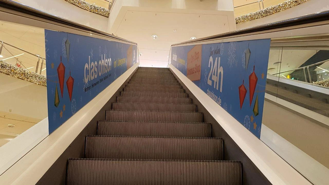 Rolltreppen- & Glasgeländer-Folierung Einkaufszentrum